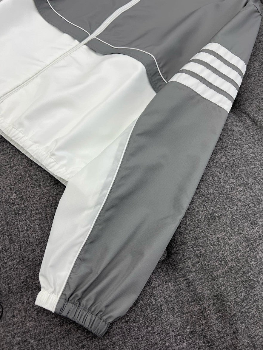 톰브라운 배색 투톤 바람막이 집업