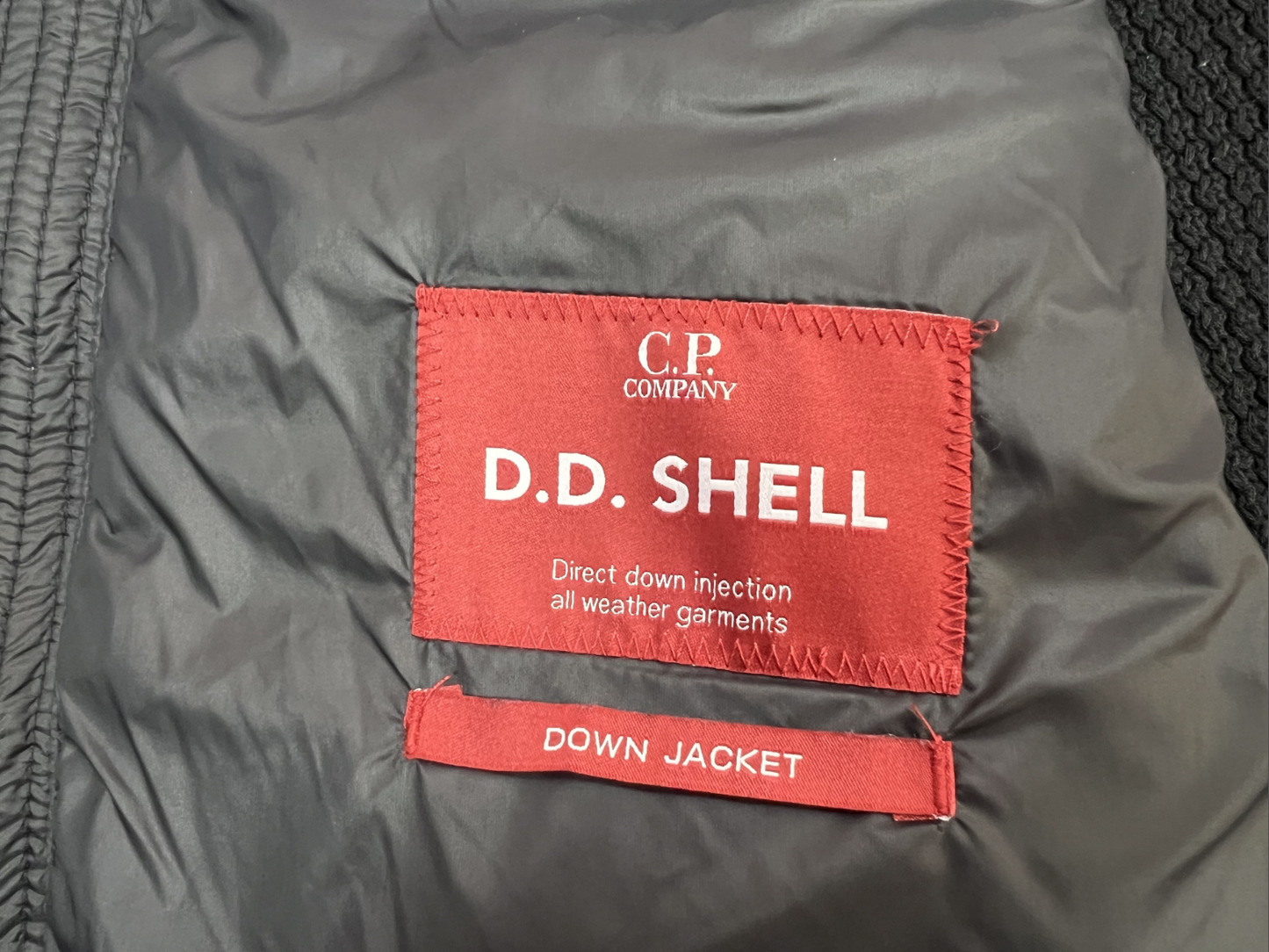 CP컴퍼니 울 니트 패딩 점퍼