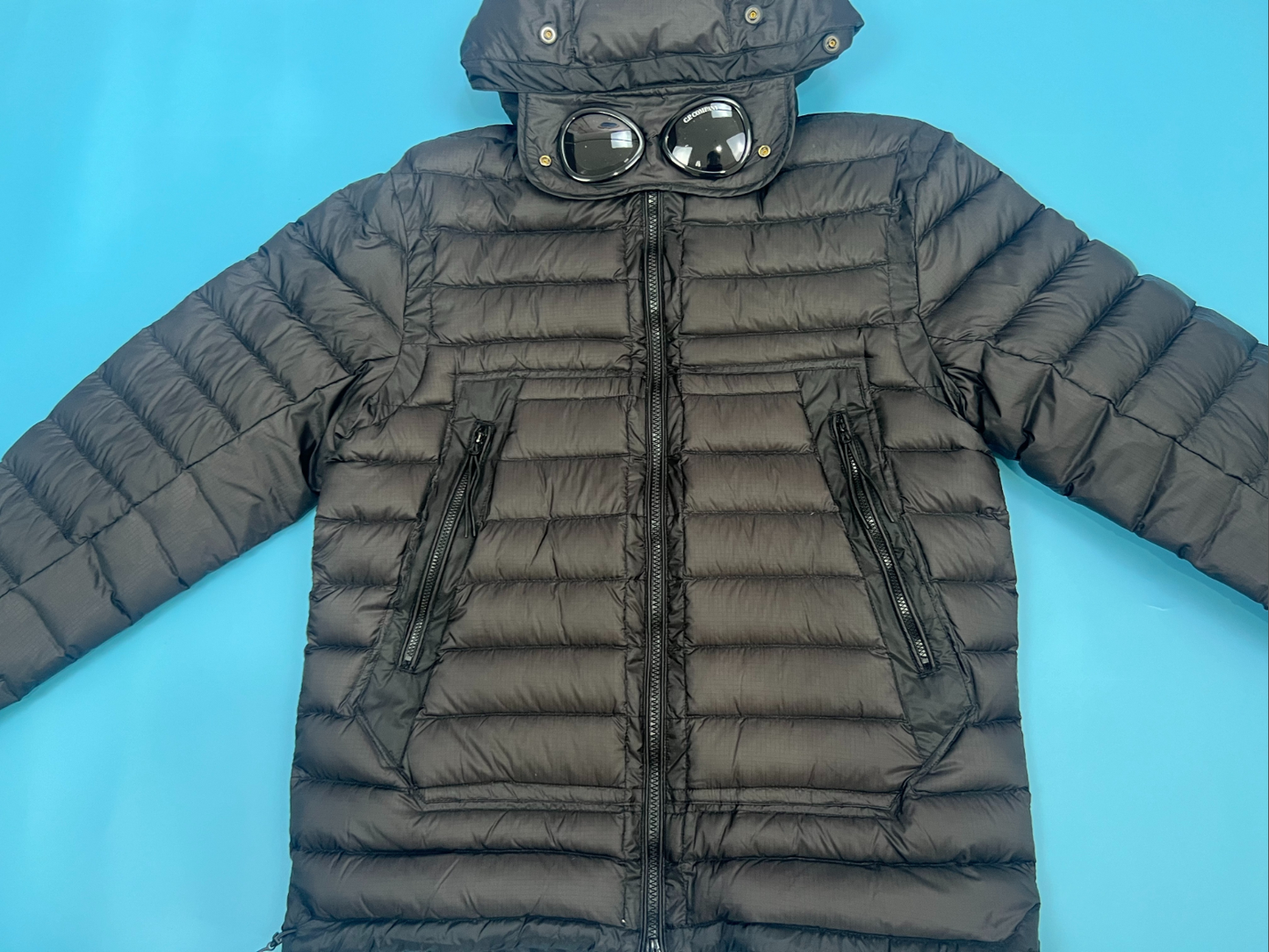 CP컴퍼니 DD Shell 고글 후드 패딩 점퍼