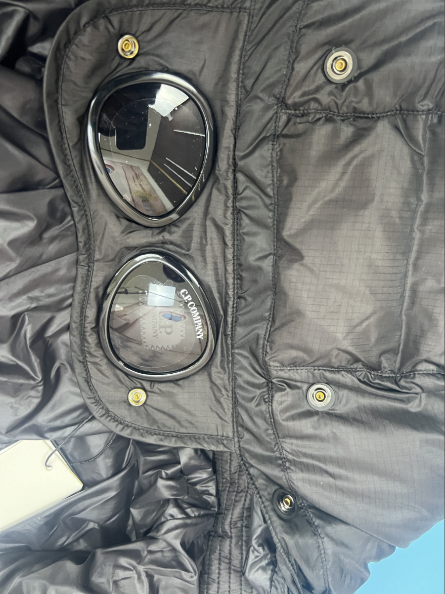 CP컴퍼니 DD Shell 고글 후드 패딩 점퍼