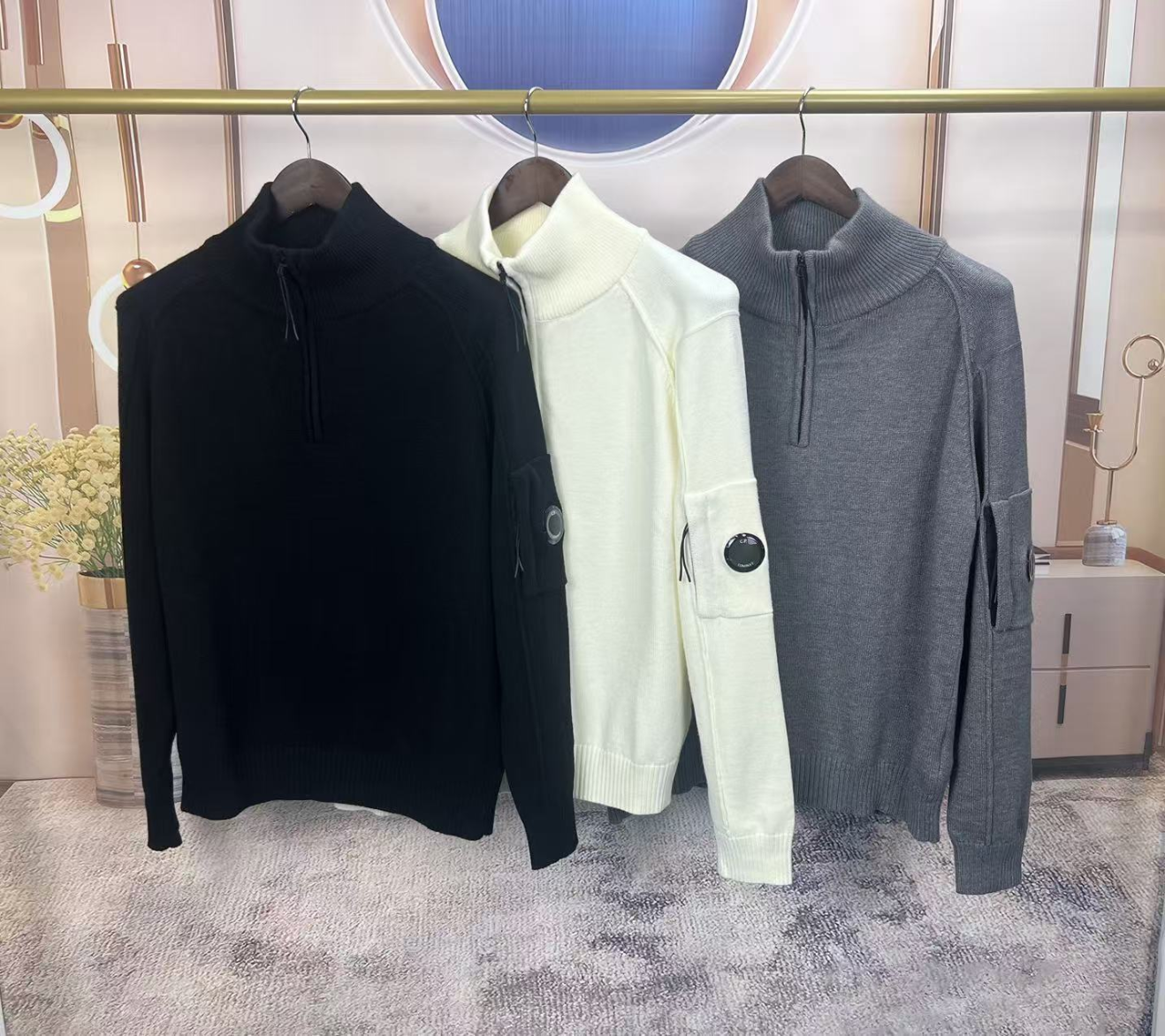 CP컴퍼니 반집업 니트