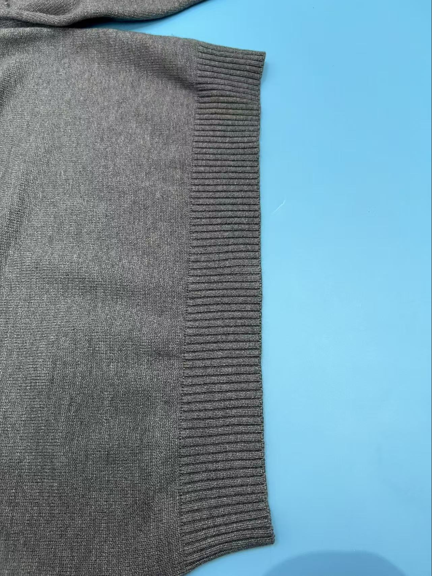 CP컴퍼니 반집업 니트